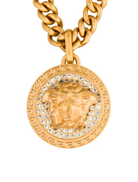 gold versace pendant